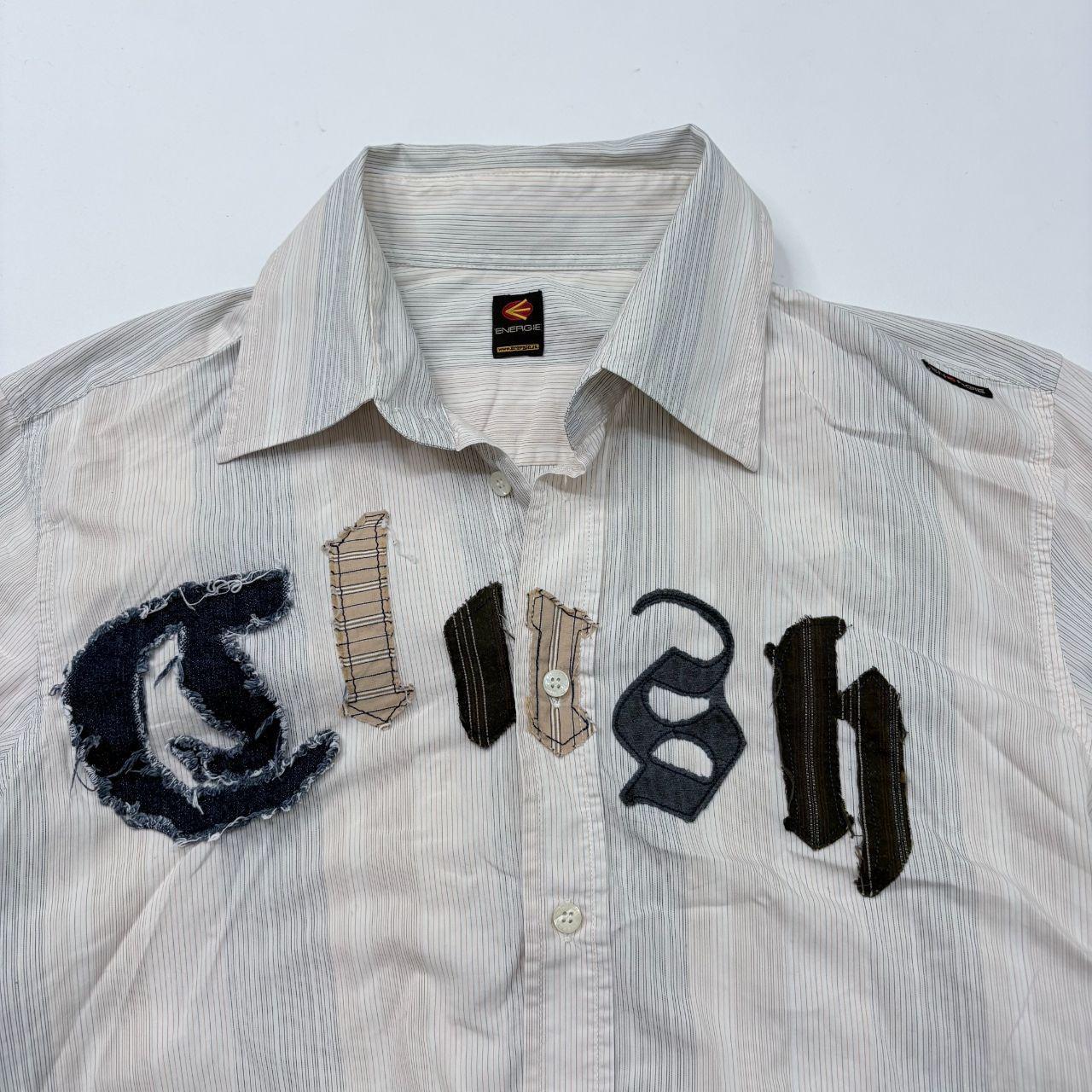 Pinstriped flared graphic shirt