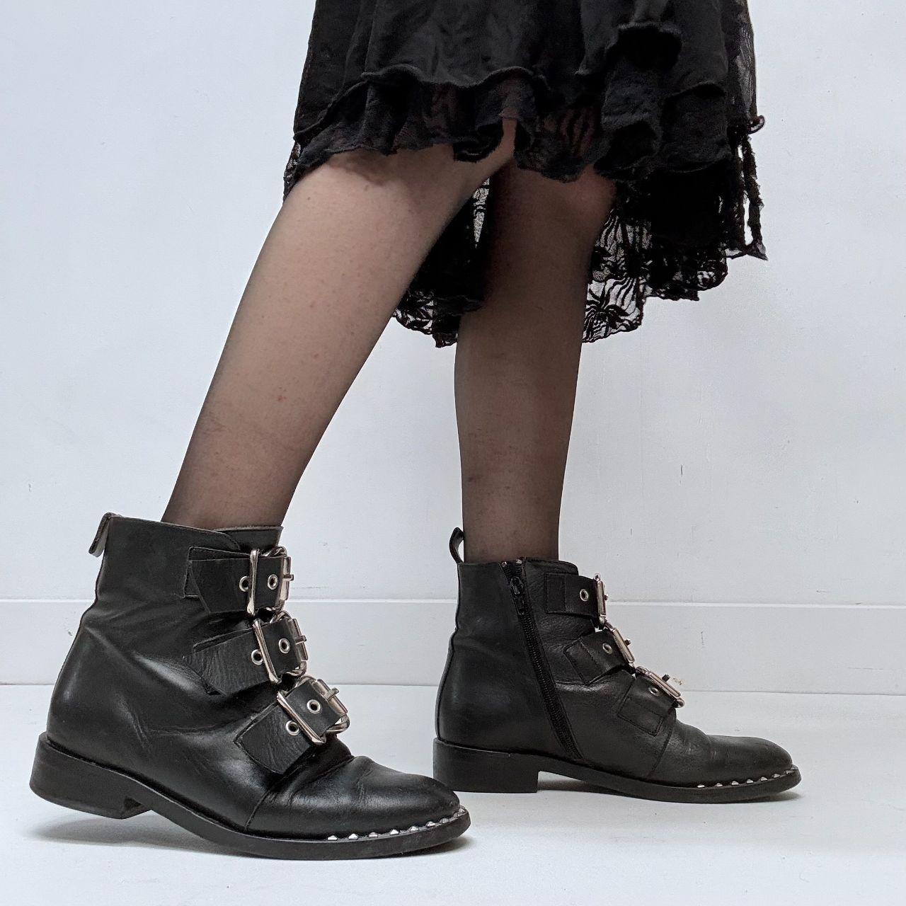 Black leather studded buckle boots