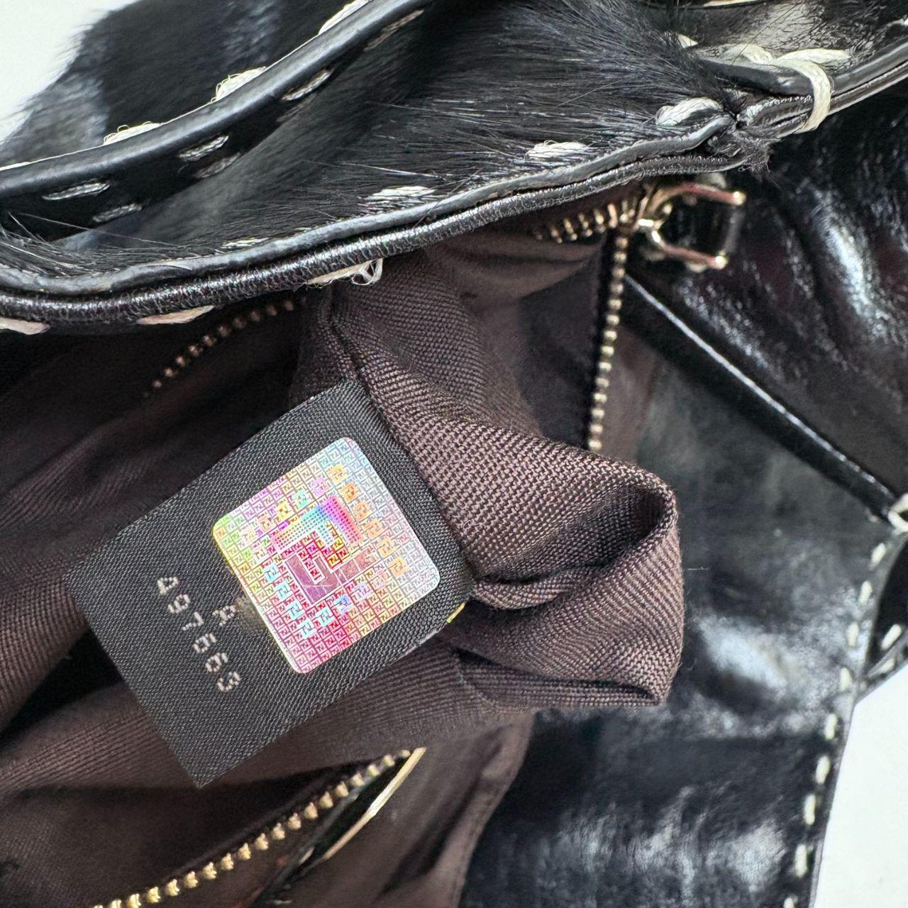 Black ponyhair Fendi eyelet bag