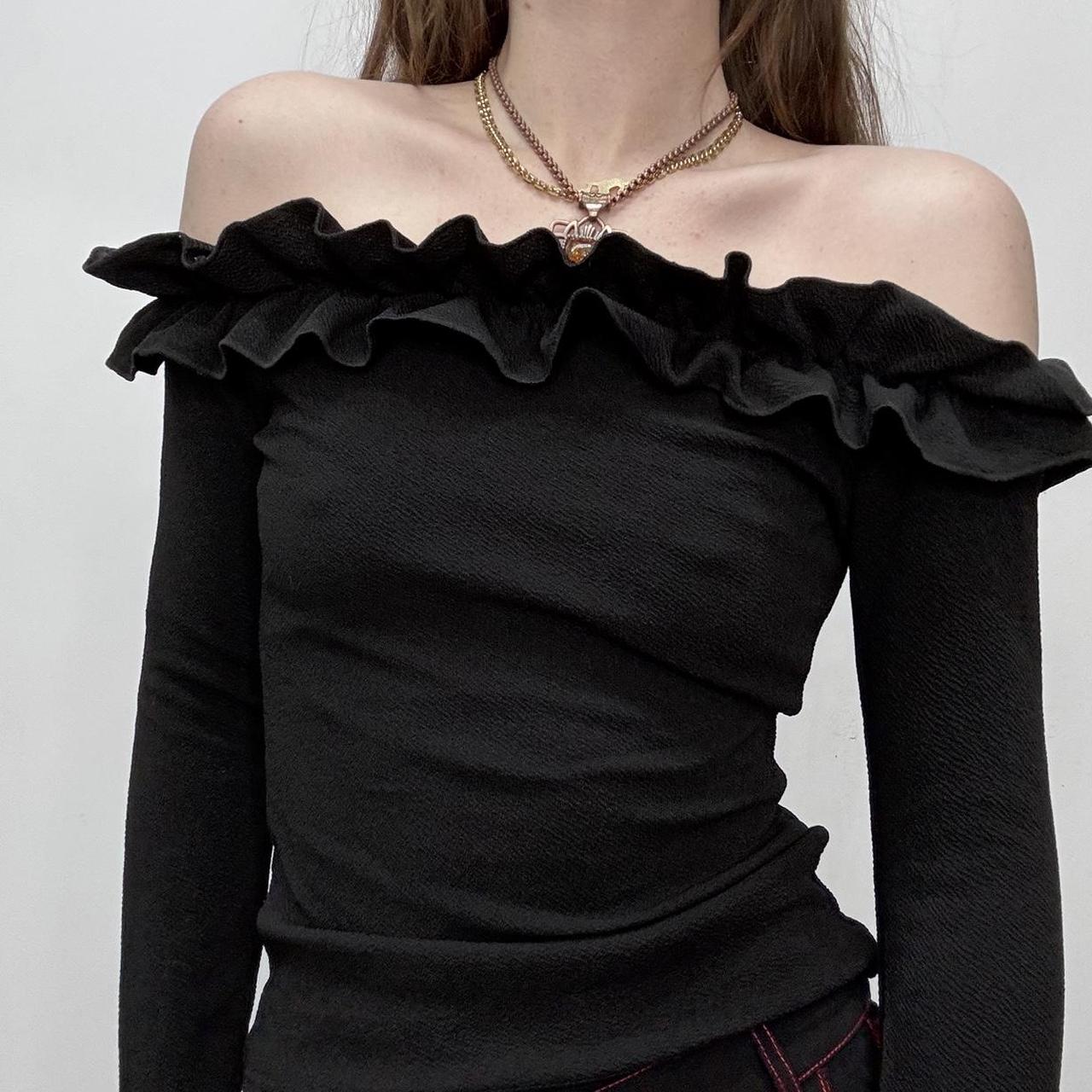 Black off the shoulder ruffle shirt
