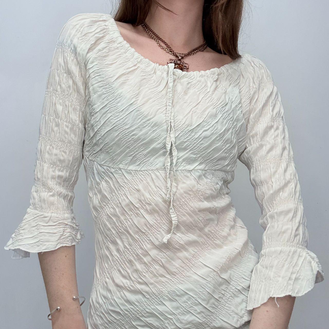 Cream flared wide neck crinkle shirt
