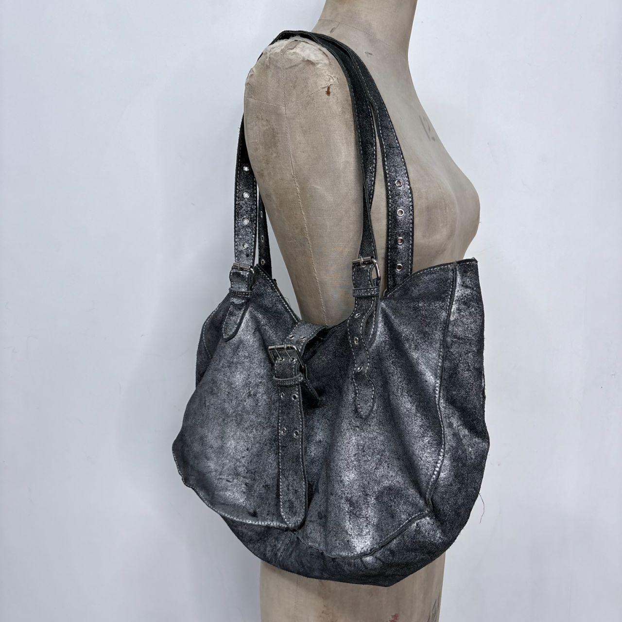 Distressed soft leather cargo buckle handbag