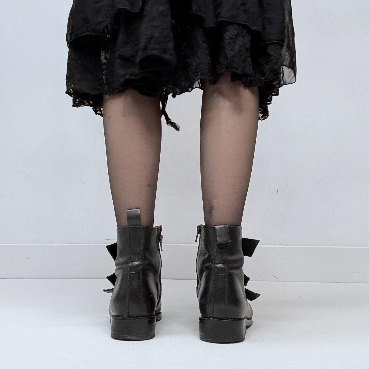 Black leather studded buckle boots