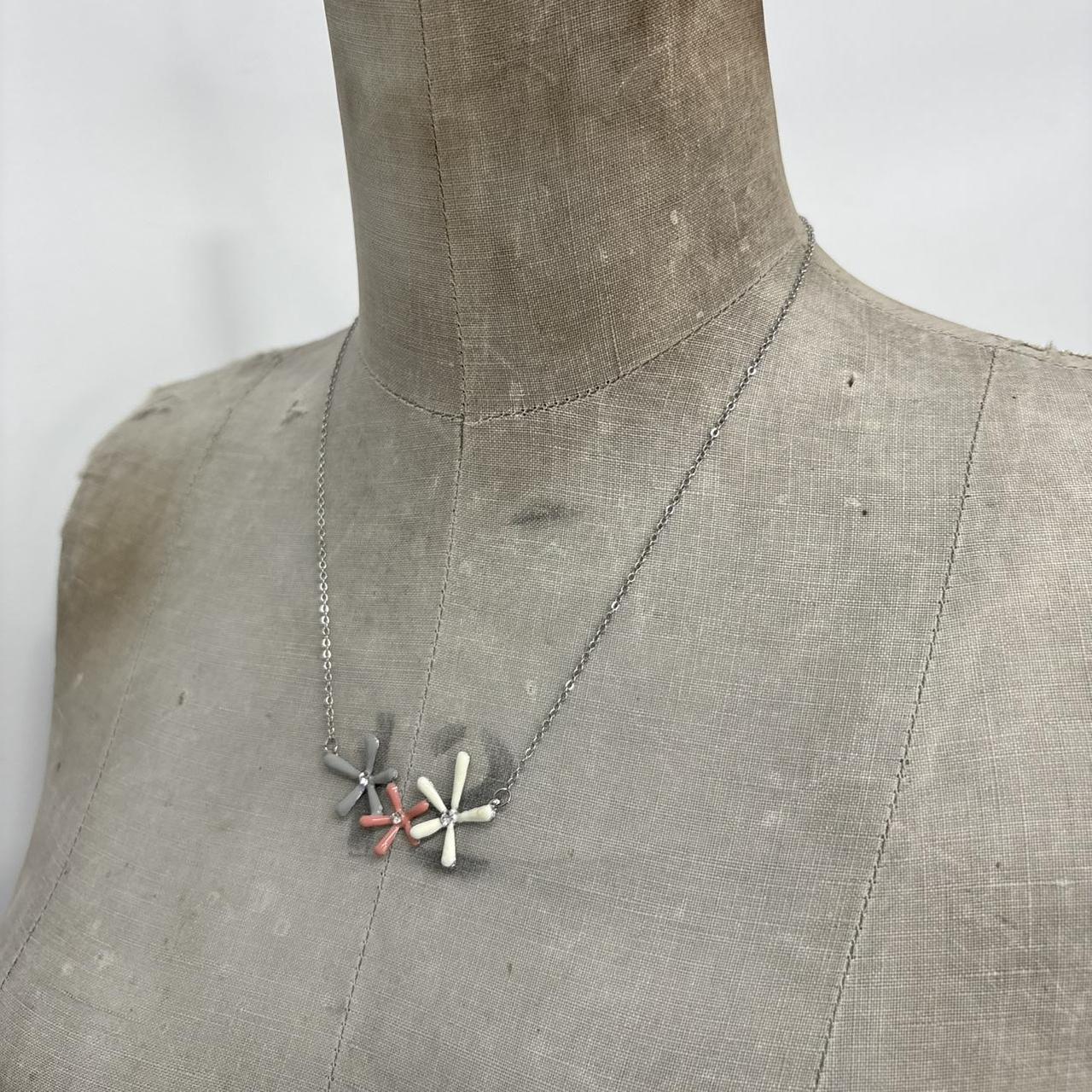 Silver flower pendant