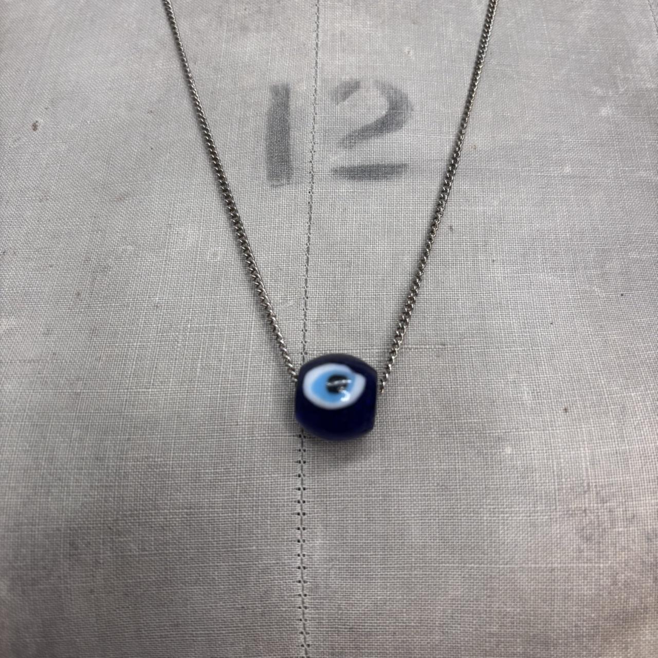Long chain evil eye necklace