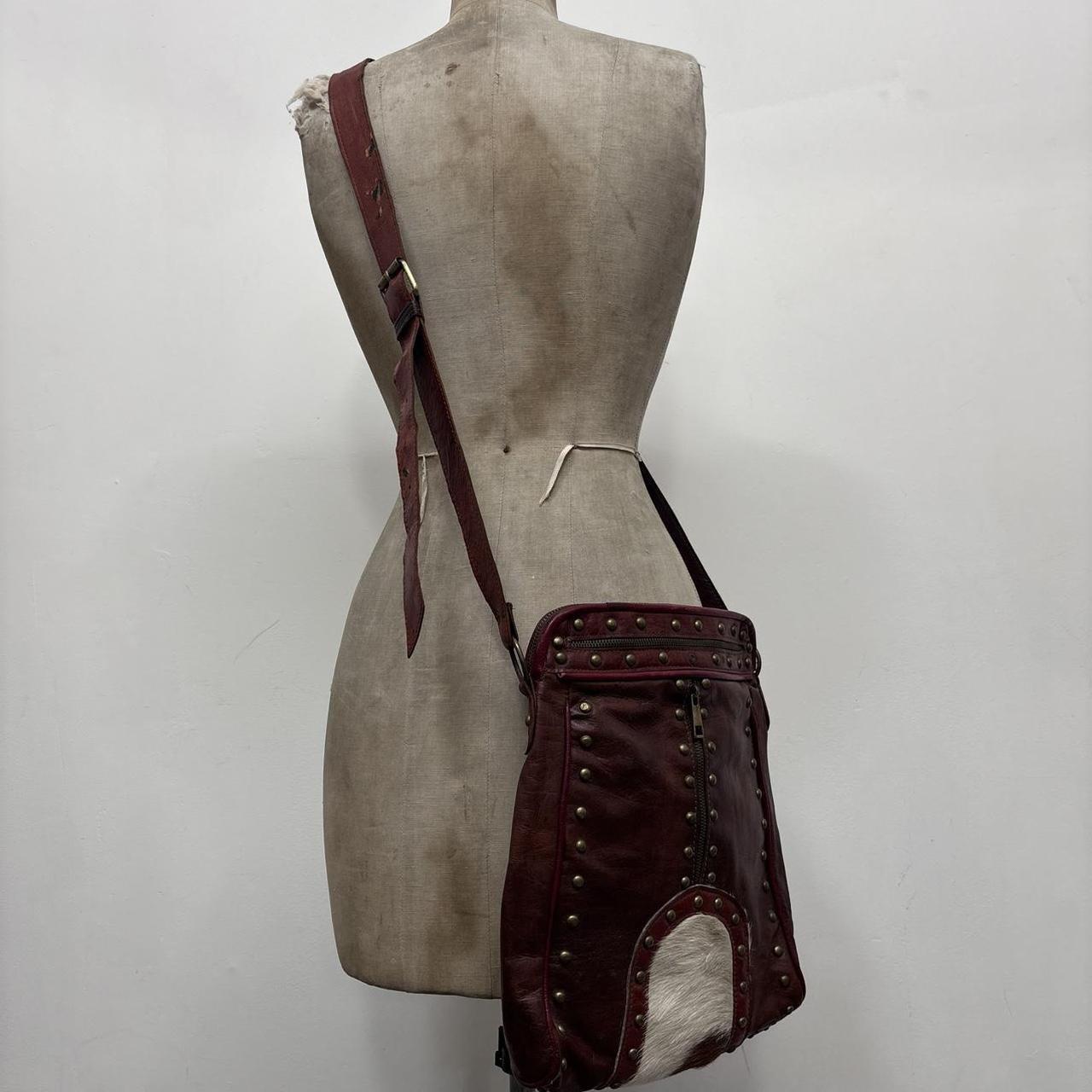 Cow hide studded brown leather bag