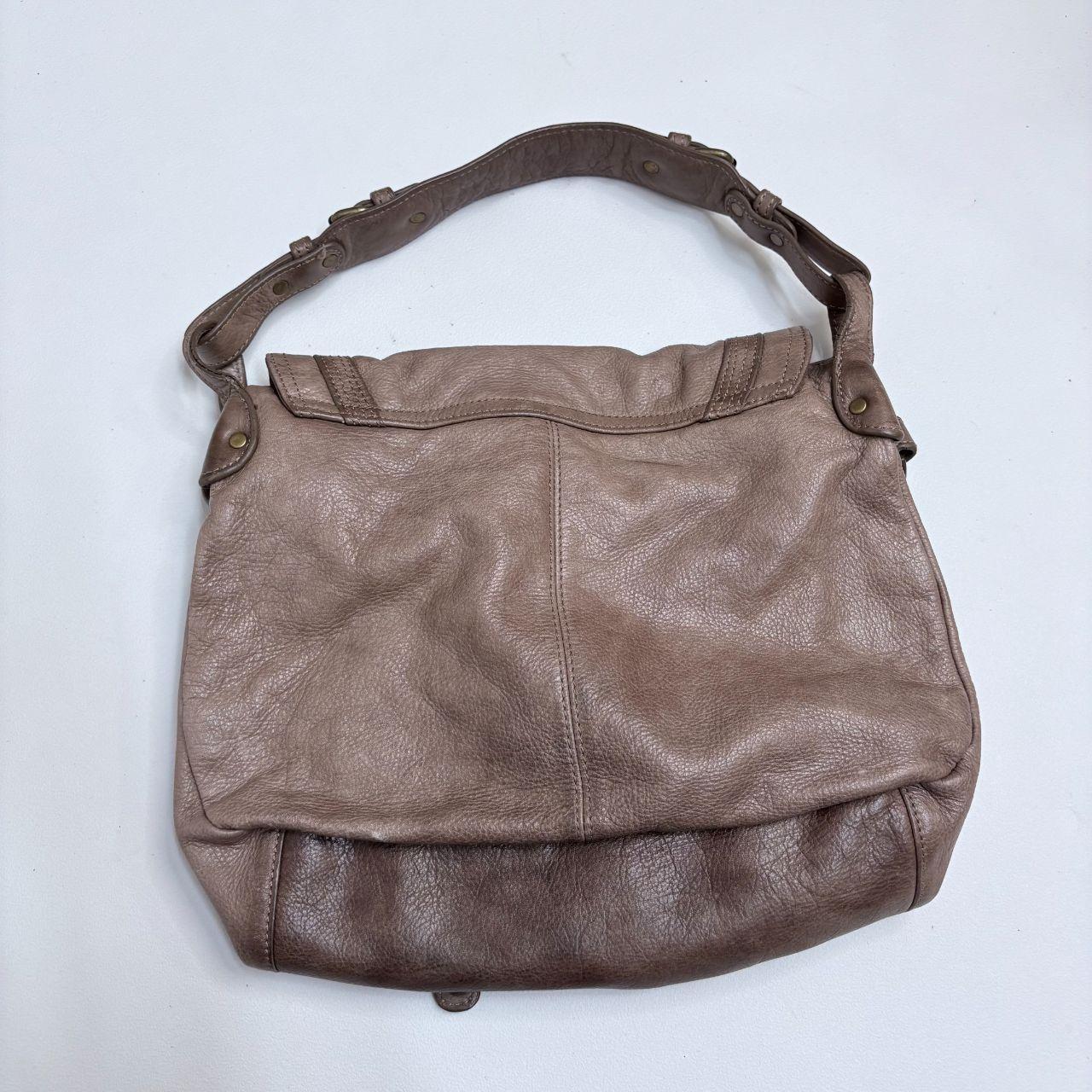 Tan leather slouchy buckle hobo bag