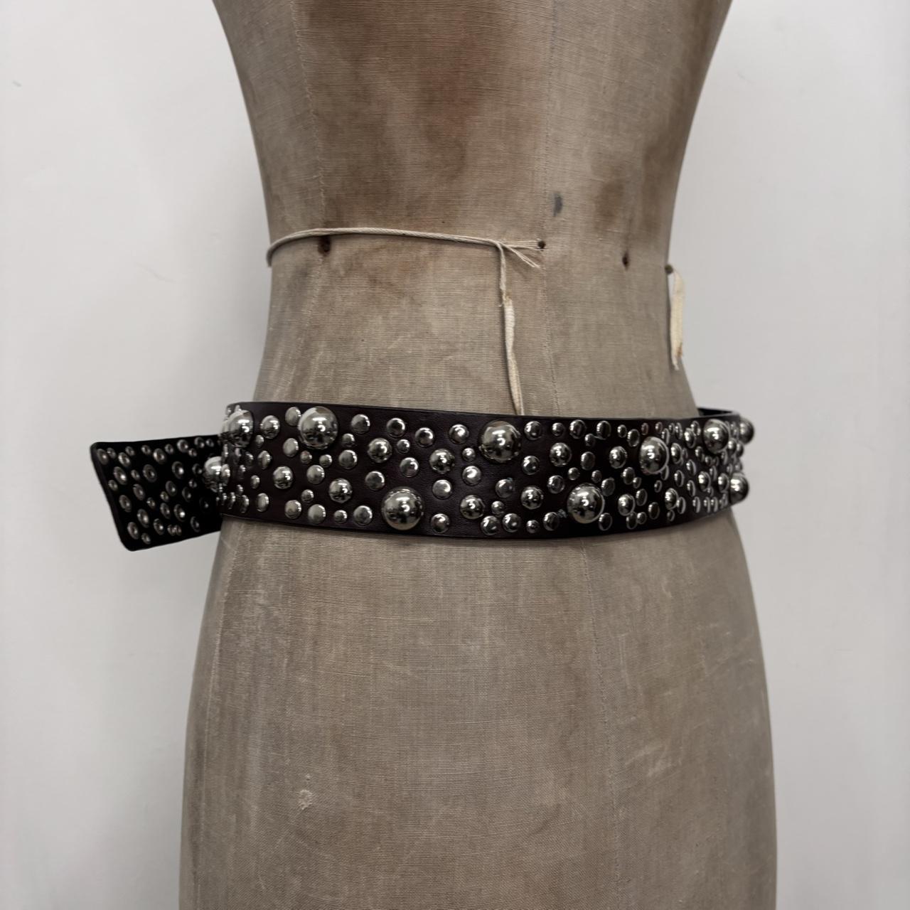 Studded silver eyelet belt