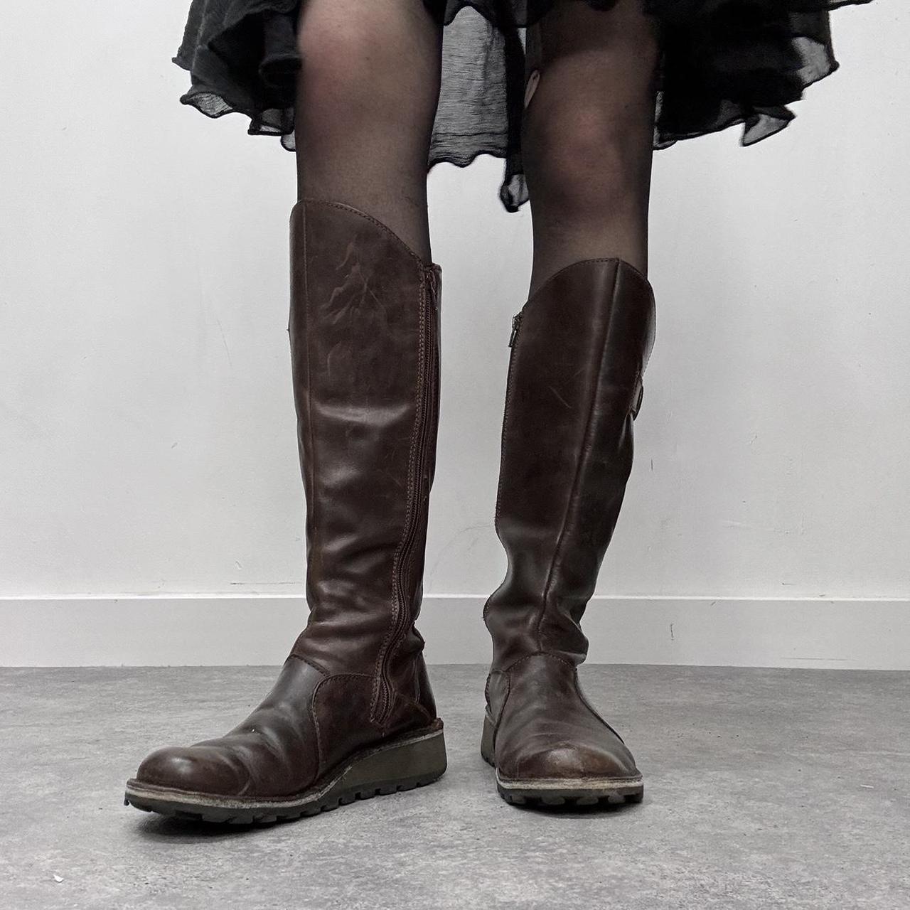 Brown leather knee high Fly boots