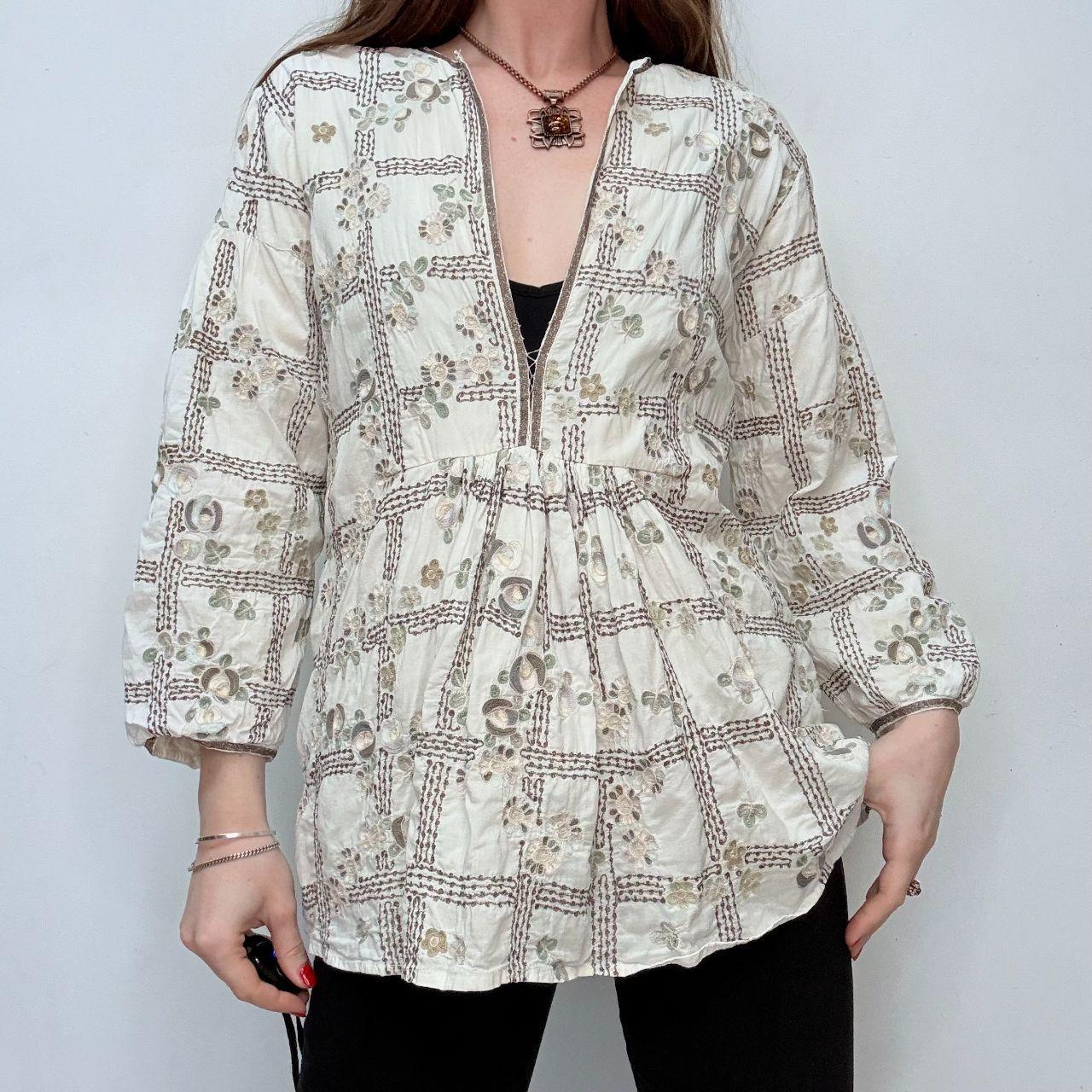White embroidered flared puff sleeve shirt