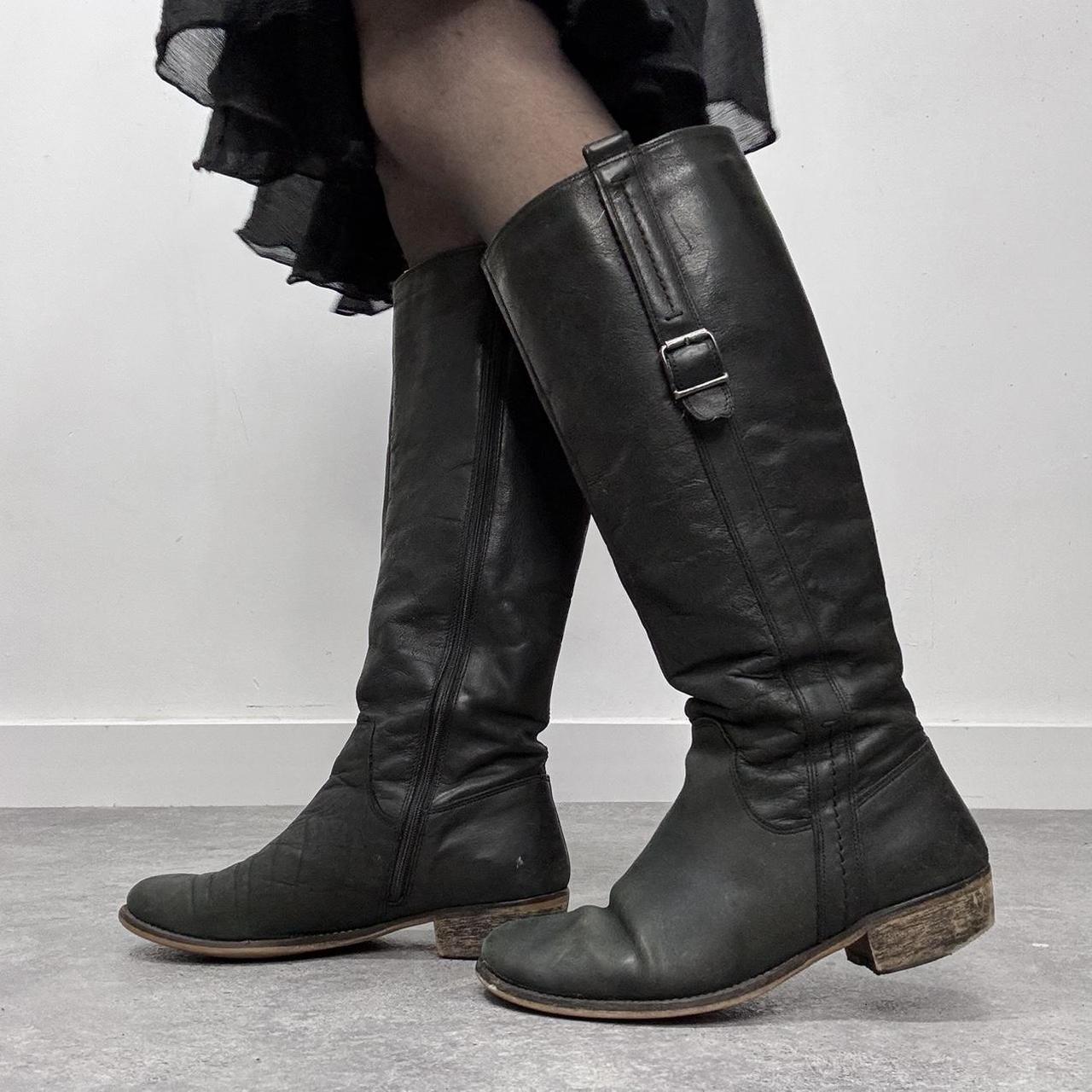Black leather knee high boots