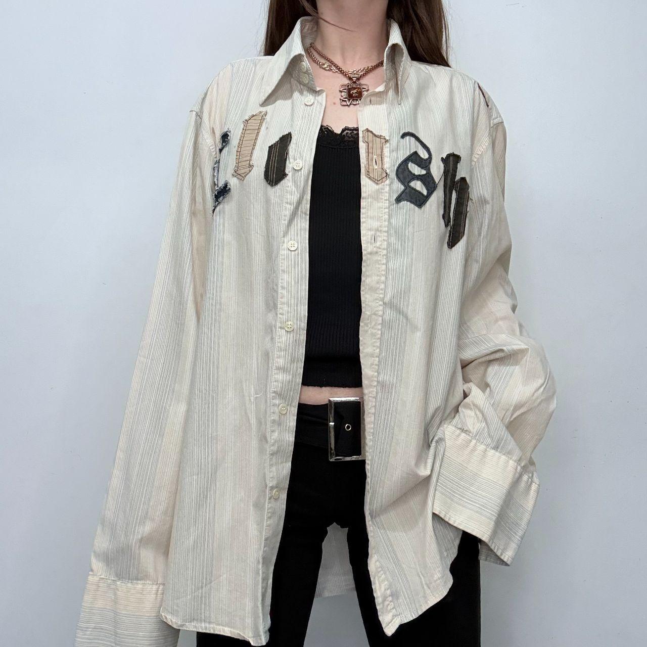 Pinstriped flared graphic shirt