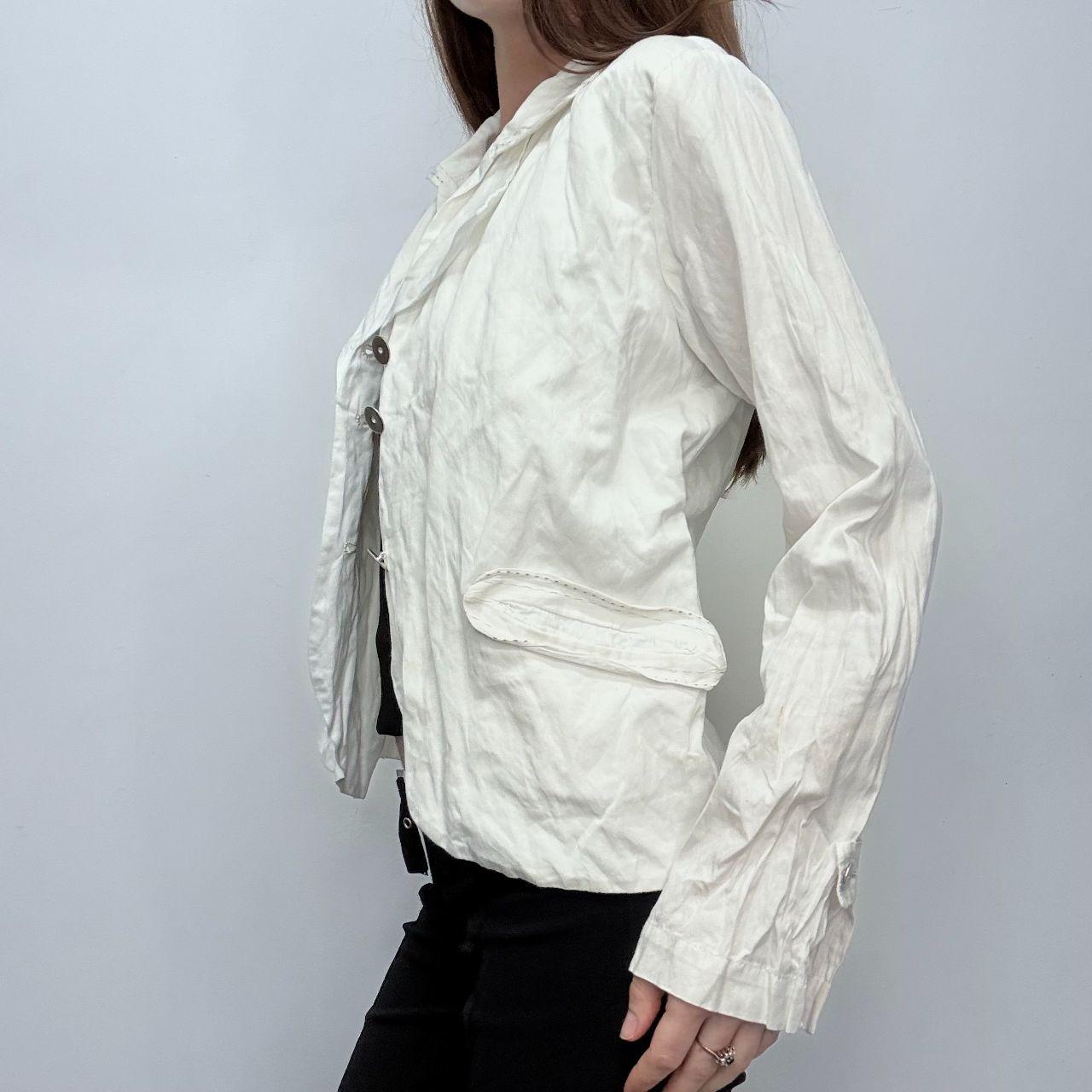 White crinkle flared jacket