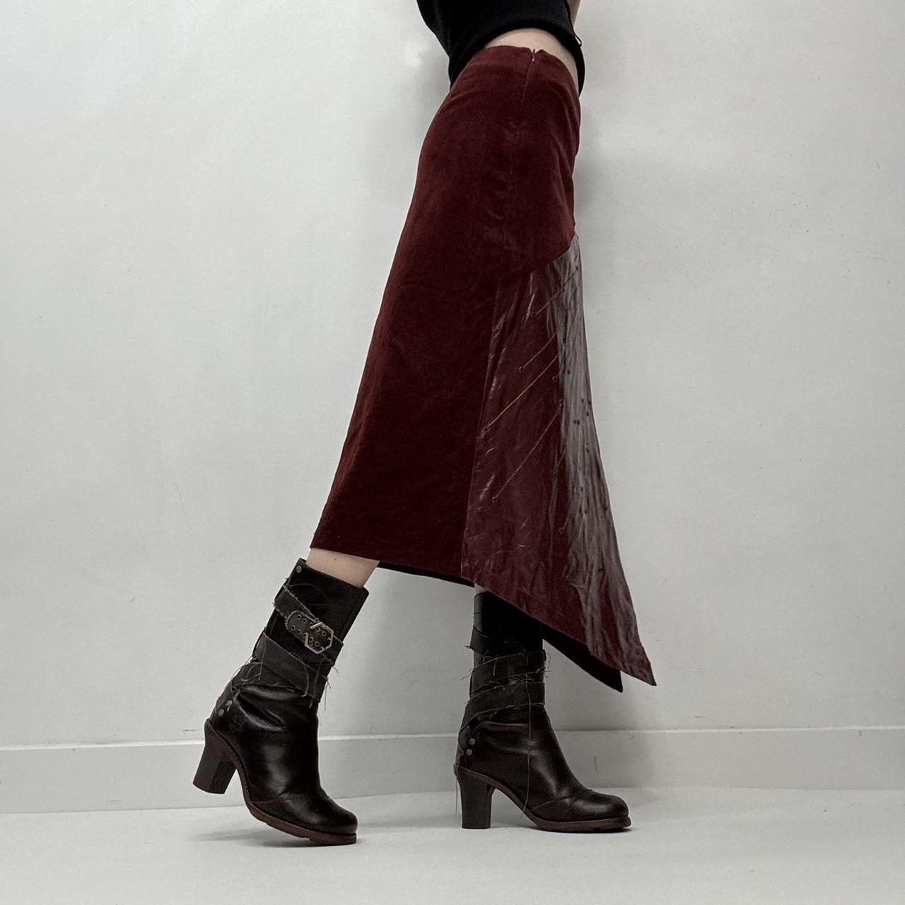 Red leather eyelet studded asymmetric skirt