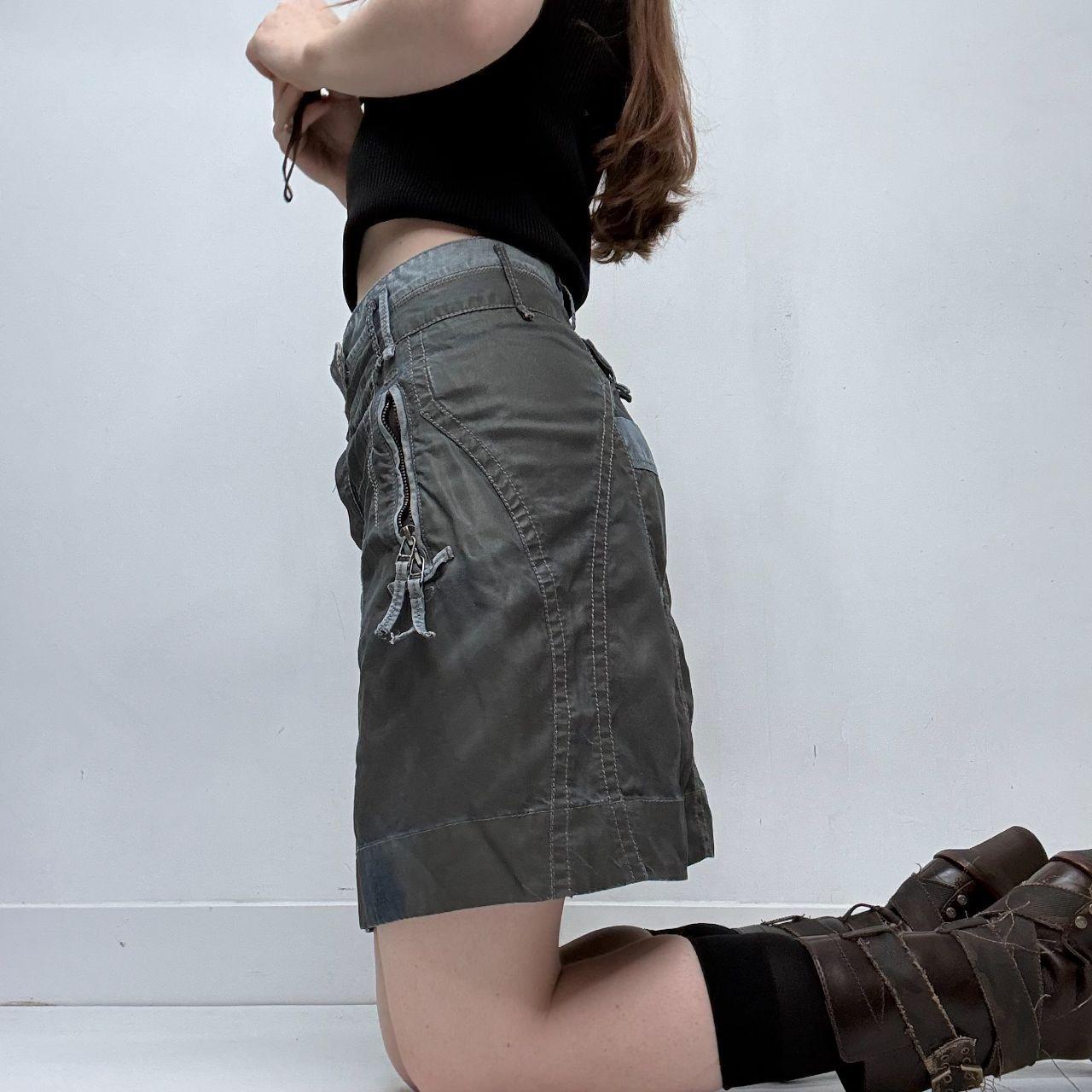 Utility cargo asymmetric button skirt