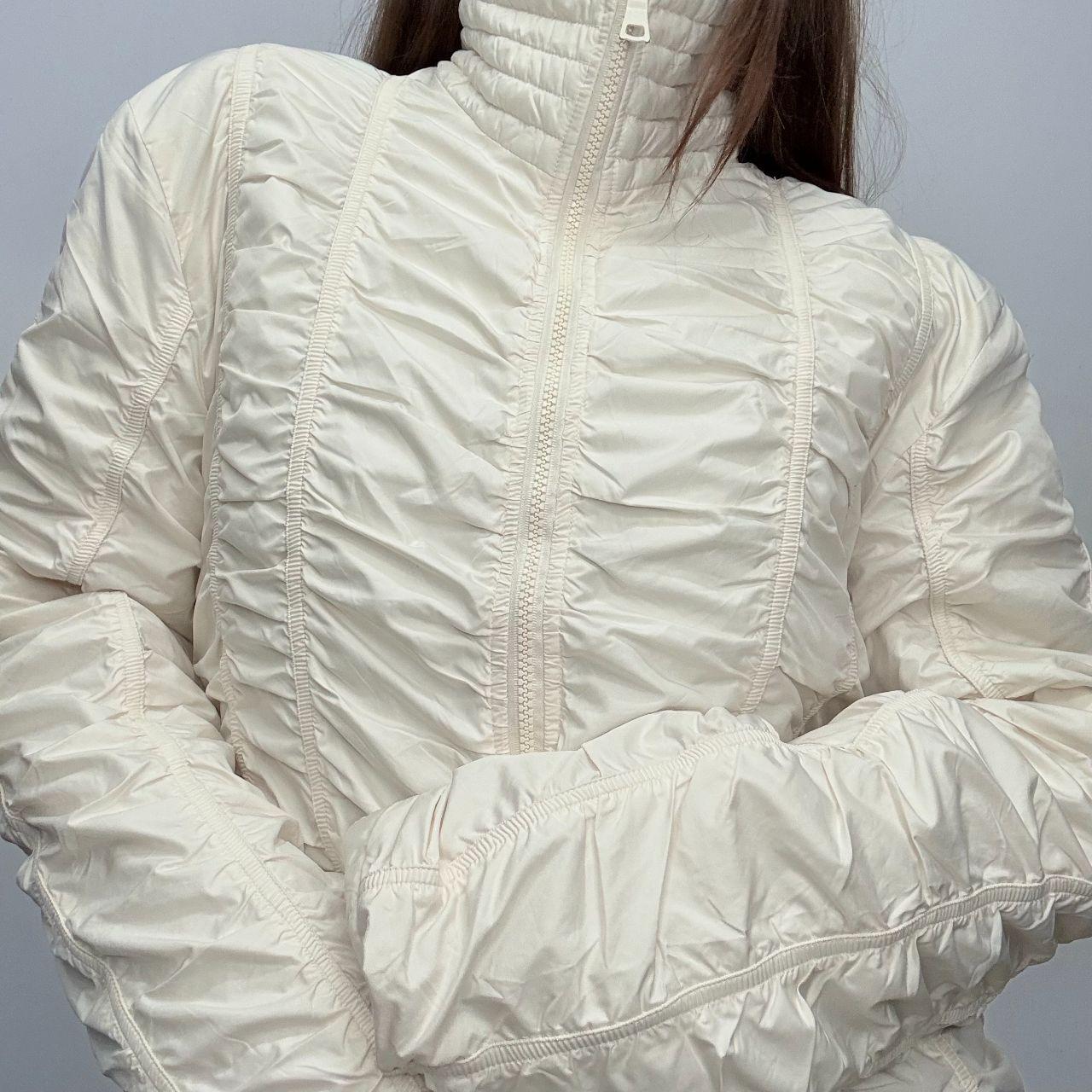 Cream crinkle gathered flared coat