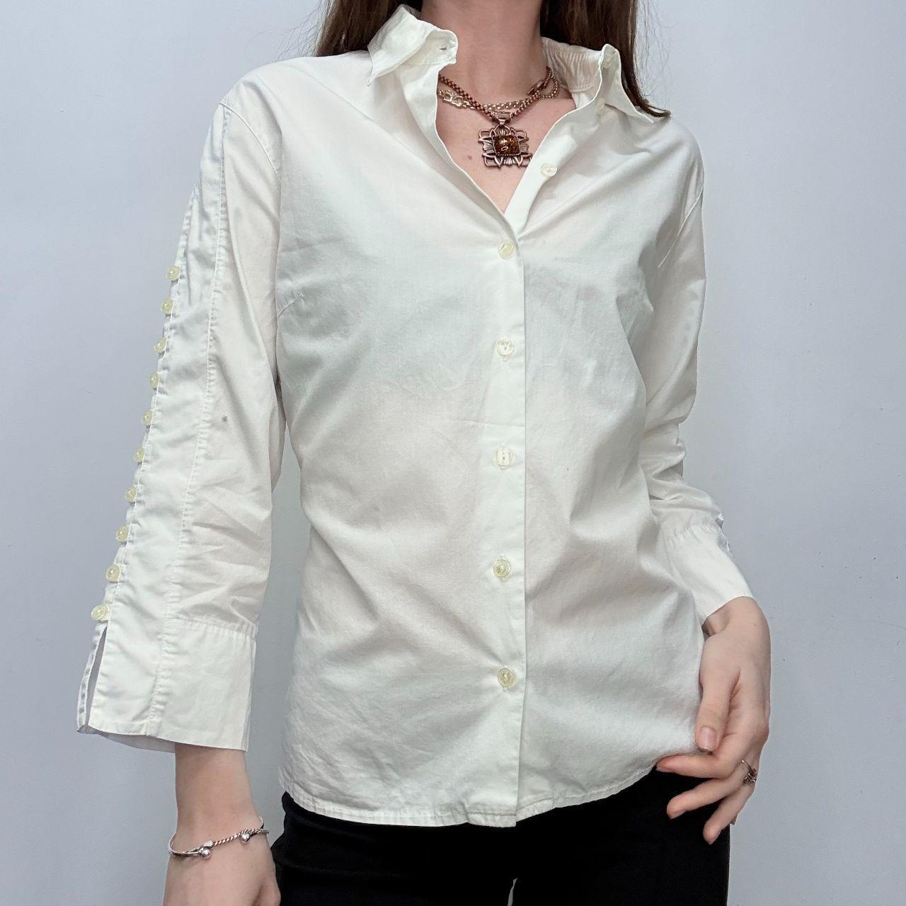 White flared button up shirt