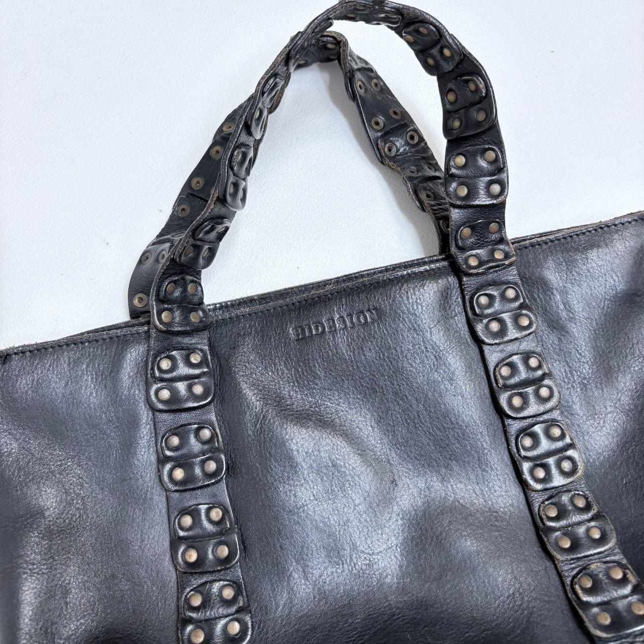 Black leather studded eyelet bag