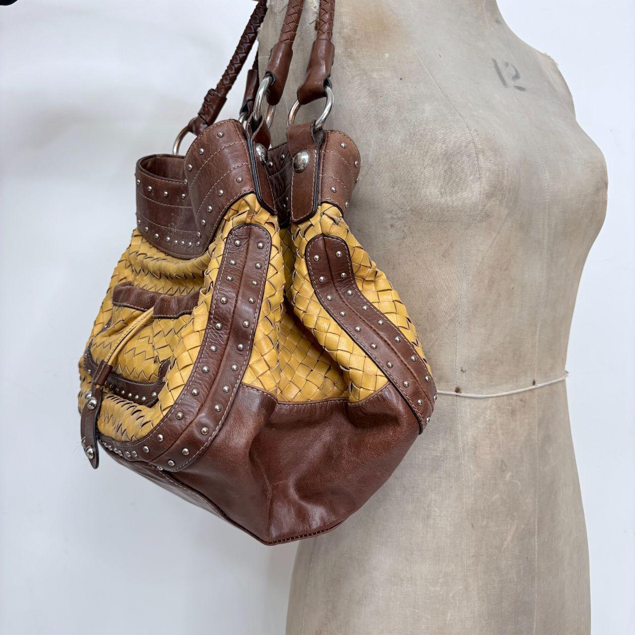 Woven leather studded slouchy shoulder bag