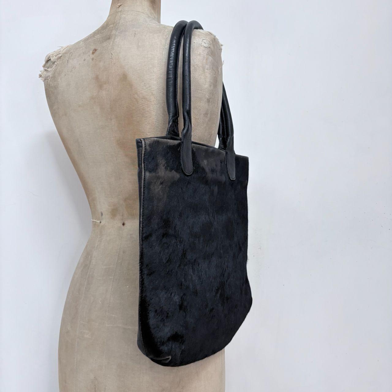 Back pony hair leather bag