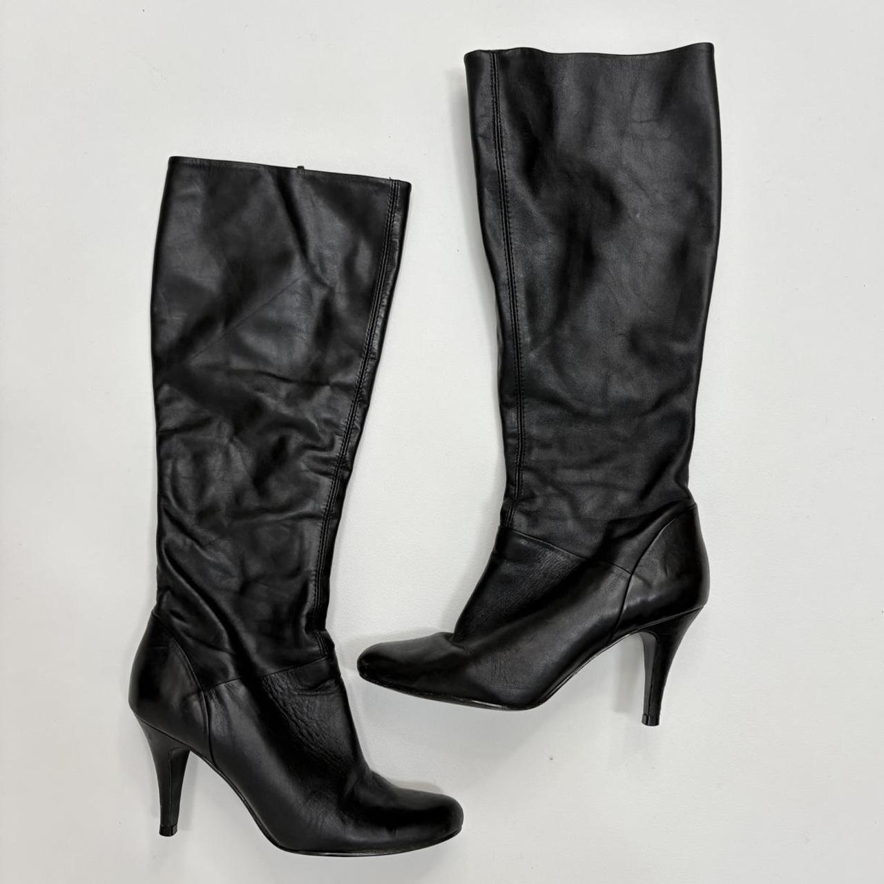 Black pointed toe heel boots