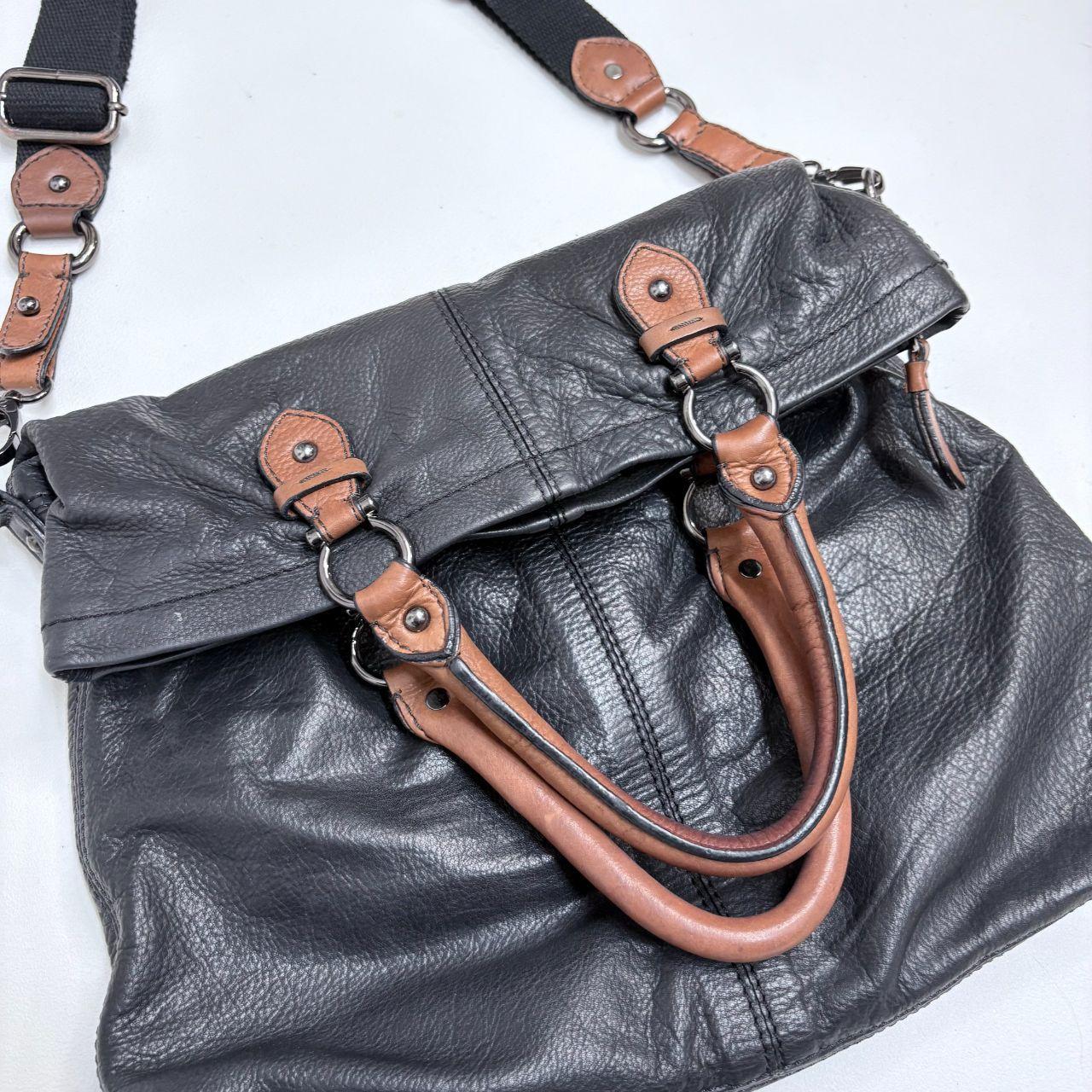 Black buckle leather bag