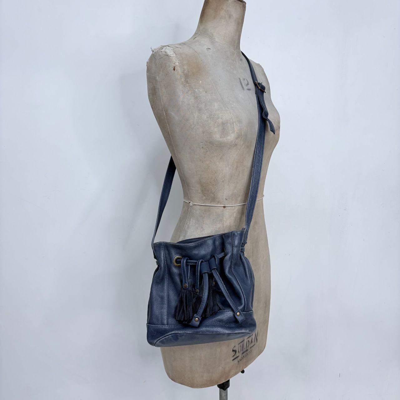 Navy blue tassle bucket bag