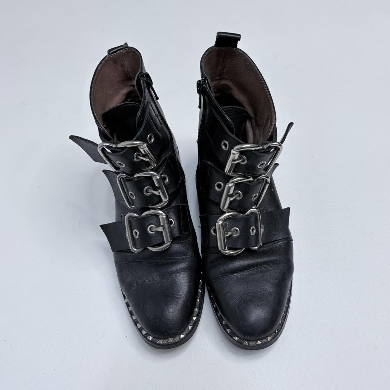 Black leather studded buckle boots