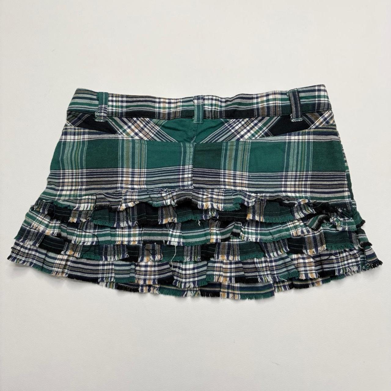 Pleated mini tartan skirt
