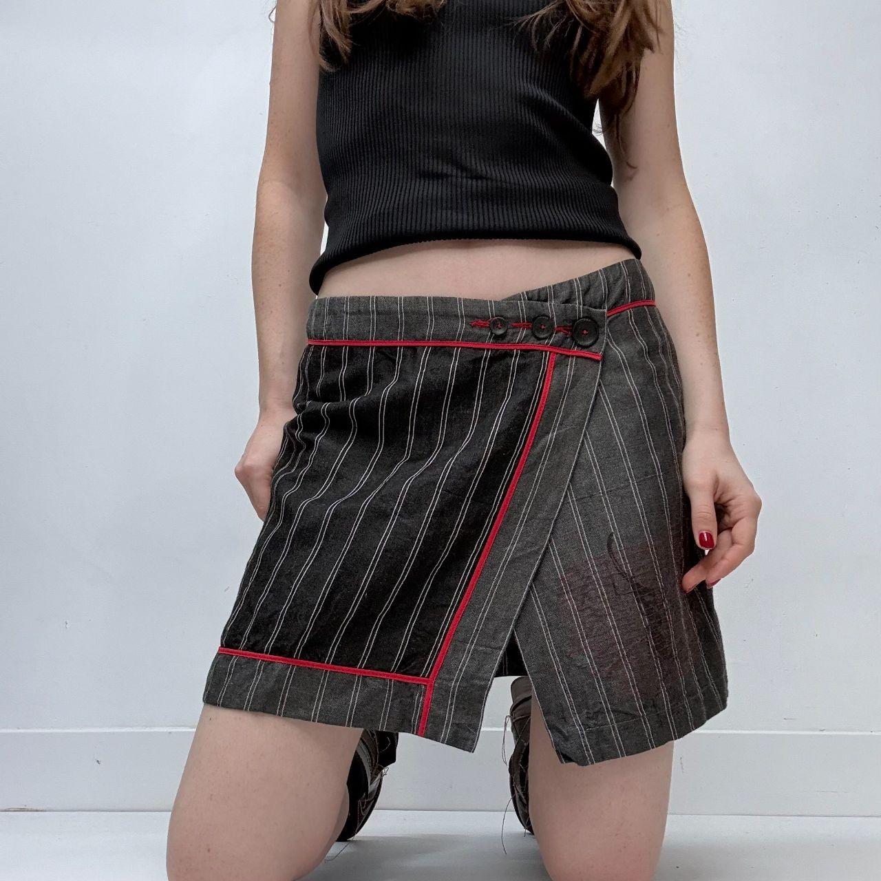 Asymmetric pinstripe cop copine mini skirt