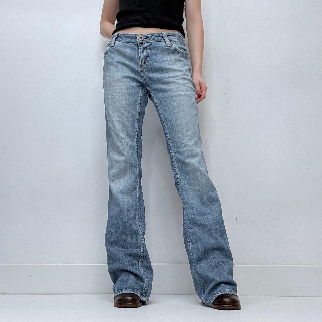 Distressed flared leg low rise jeans