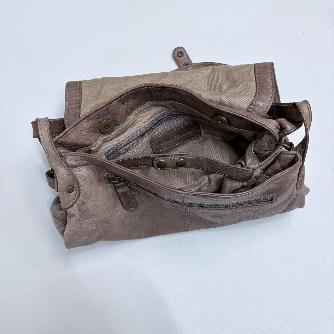 Tan leather slouchy buckle hobo bag