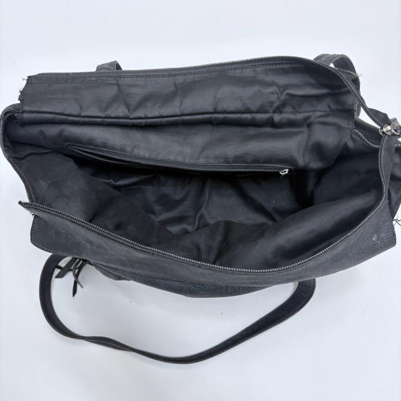 Black leather slouchy tassel bag