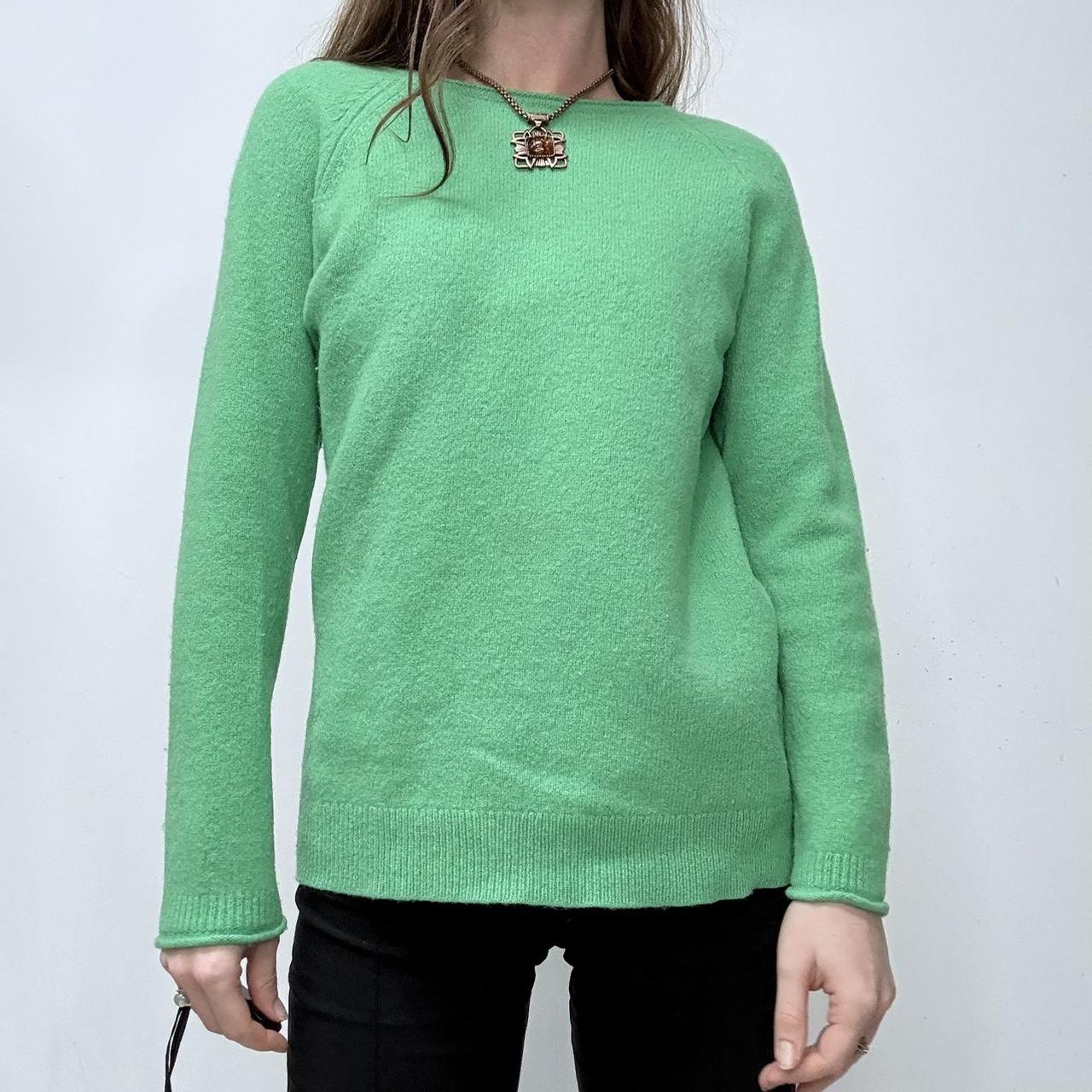Green wool knitted jumper