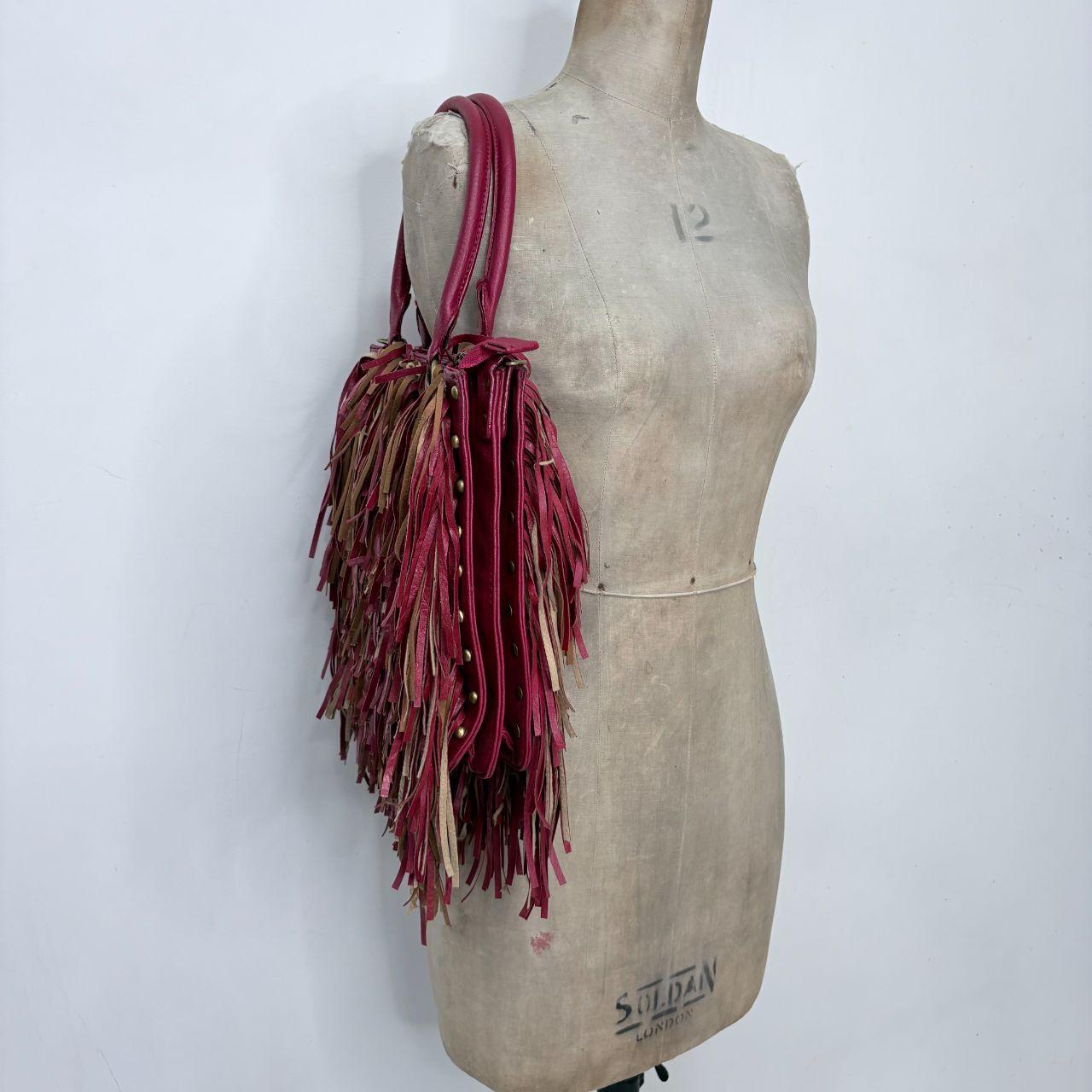 Red leather fringe bag