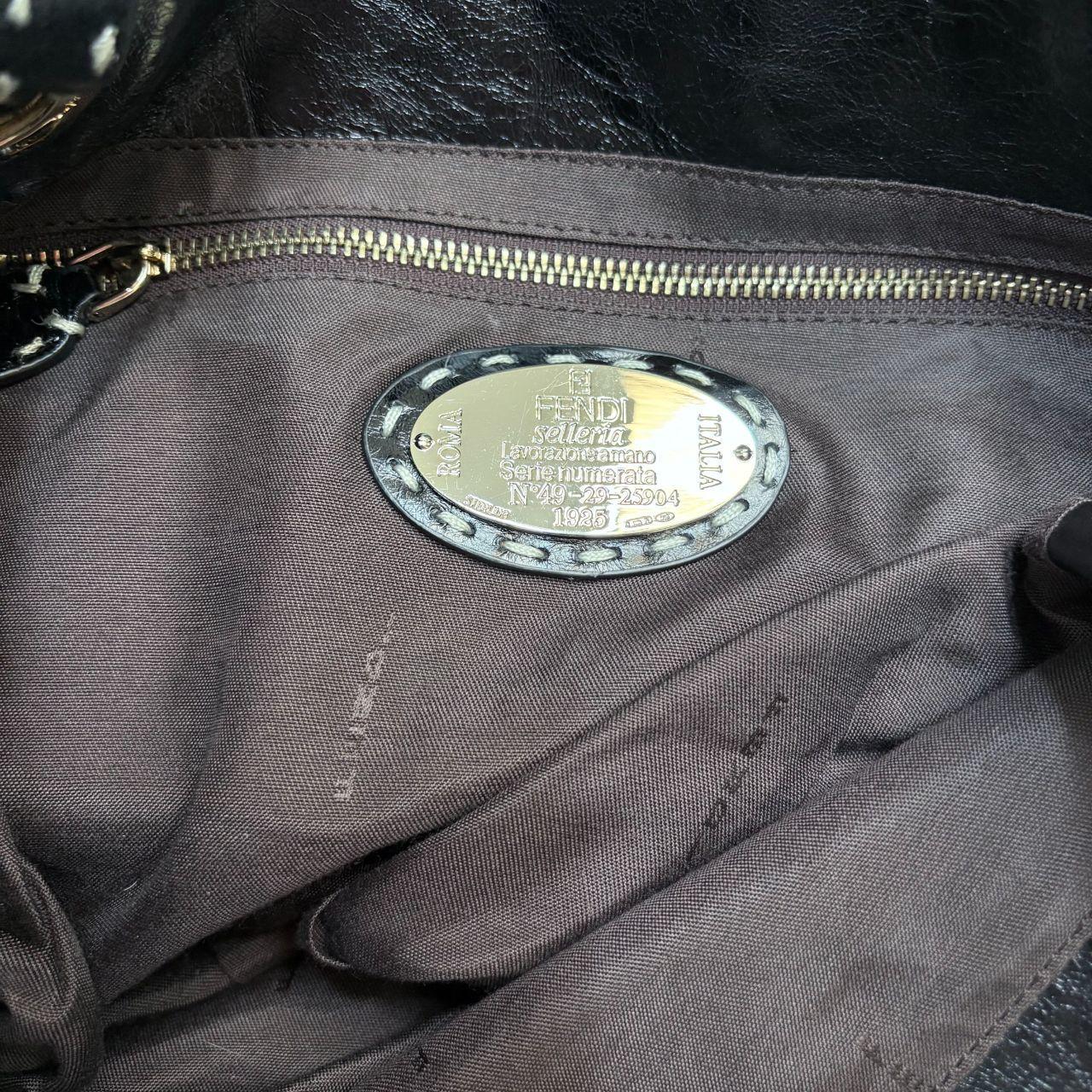 Black ponyhair Fendi eyelet bag