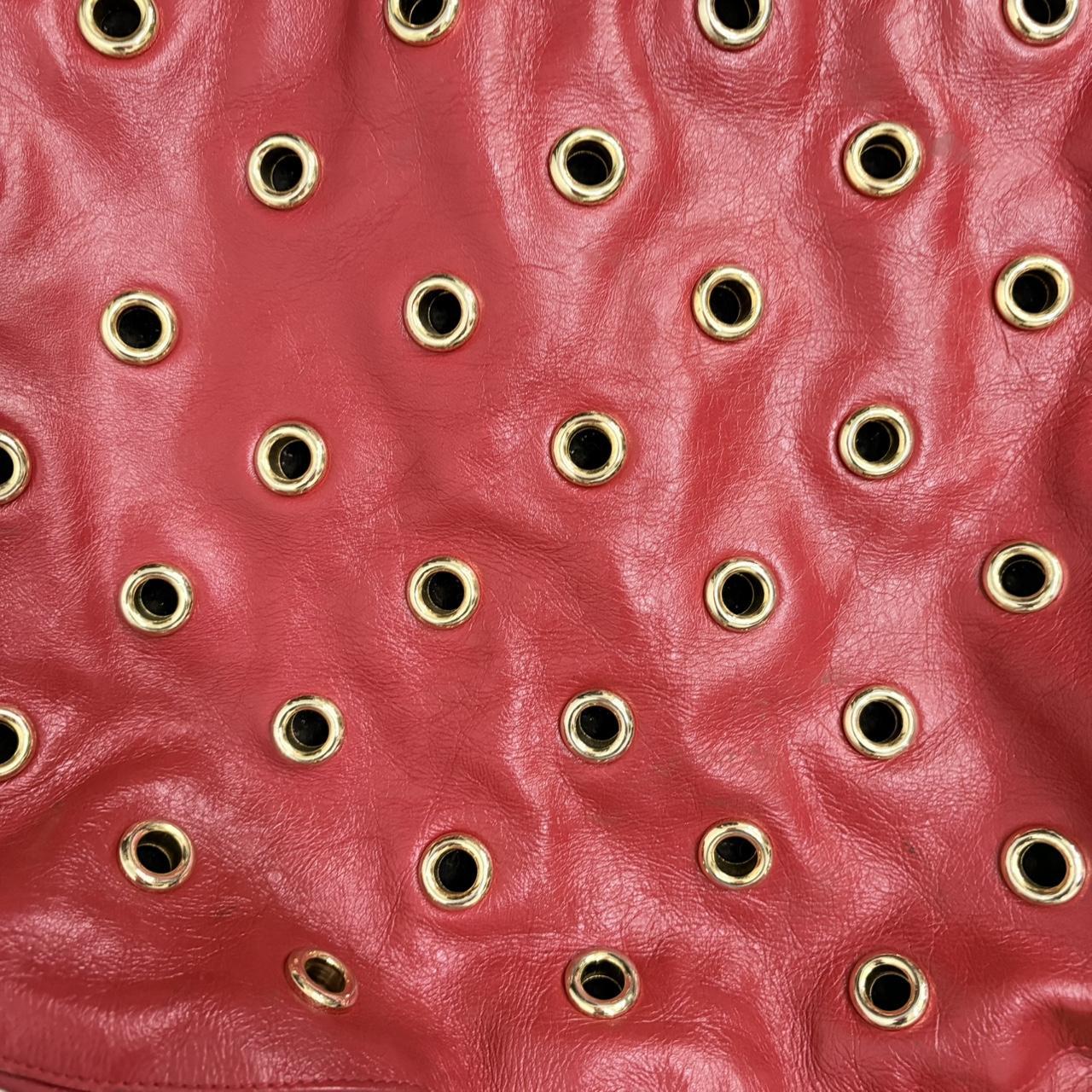 Red leather studded eyelet bag