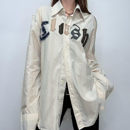 Pinstriped flared graphic shirt
