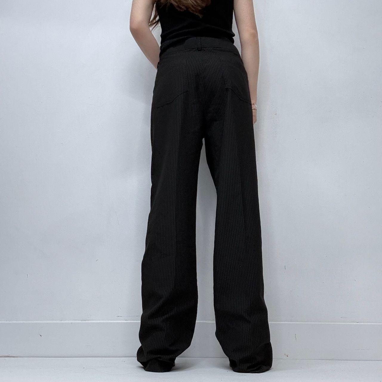 Black pinstriped flared trousers