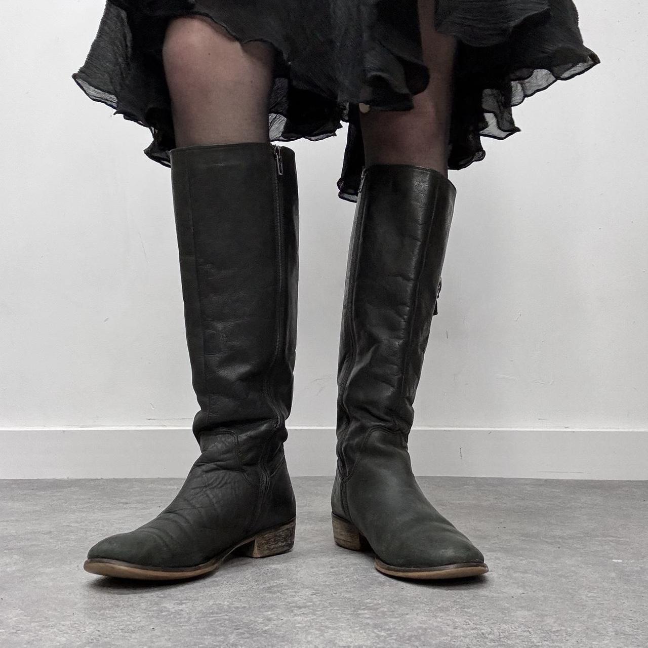 Black leather knee high boots