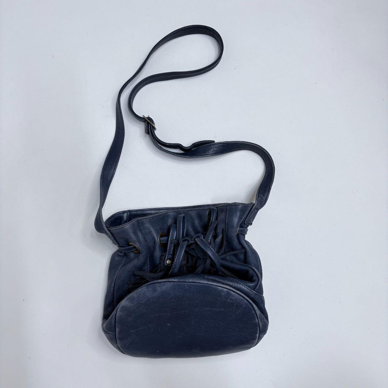 Navy blue tassle bucket bag