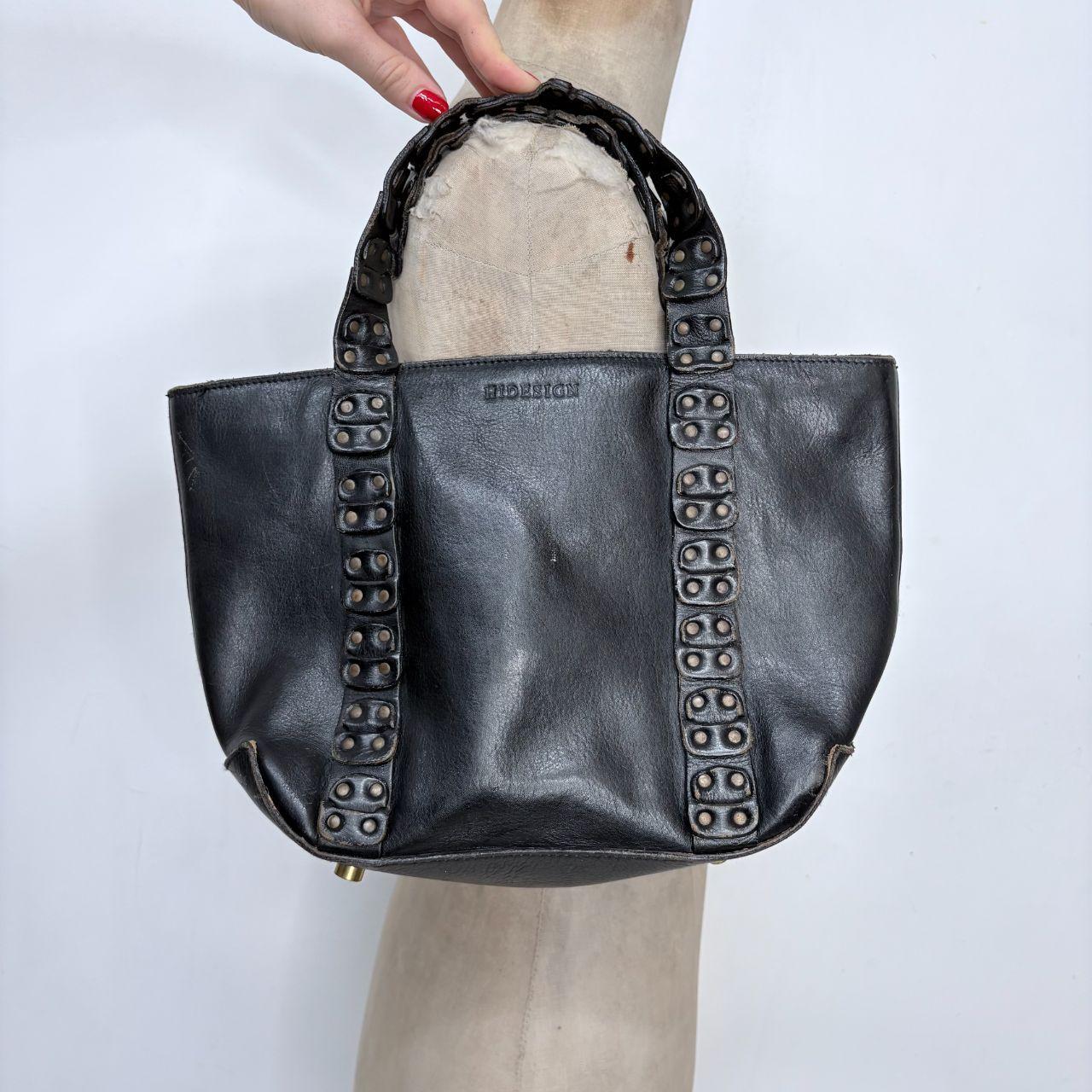 Black leather studded eyelet bag