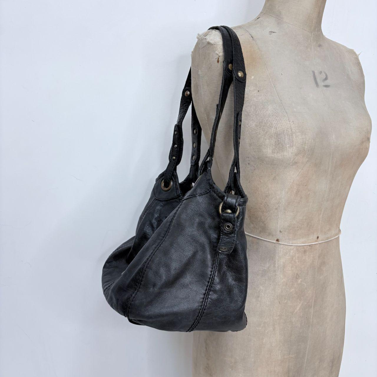 Black leather studded slouchy bag