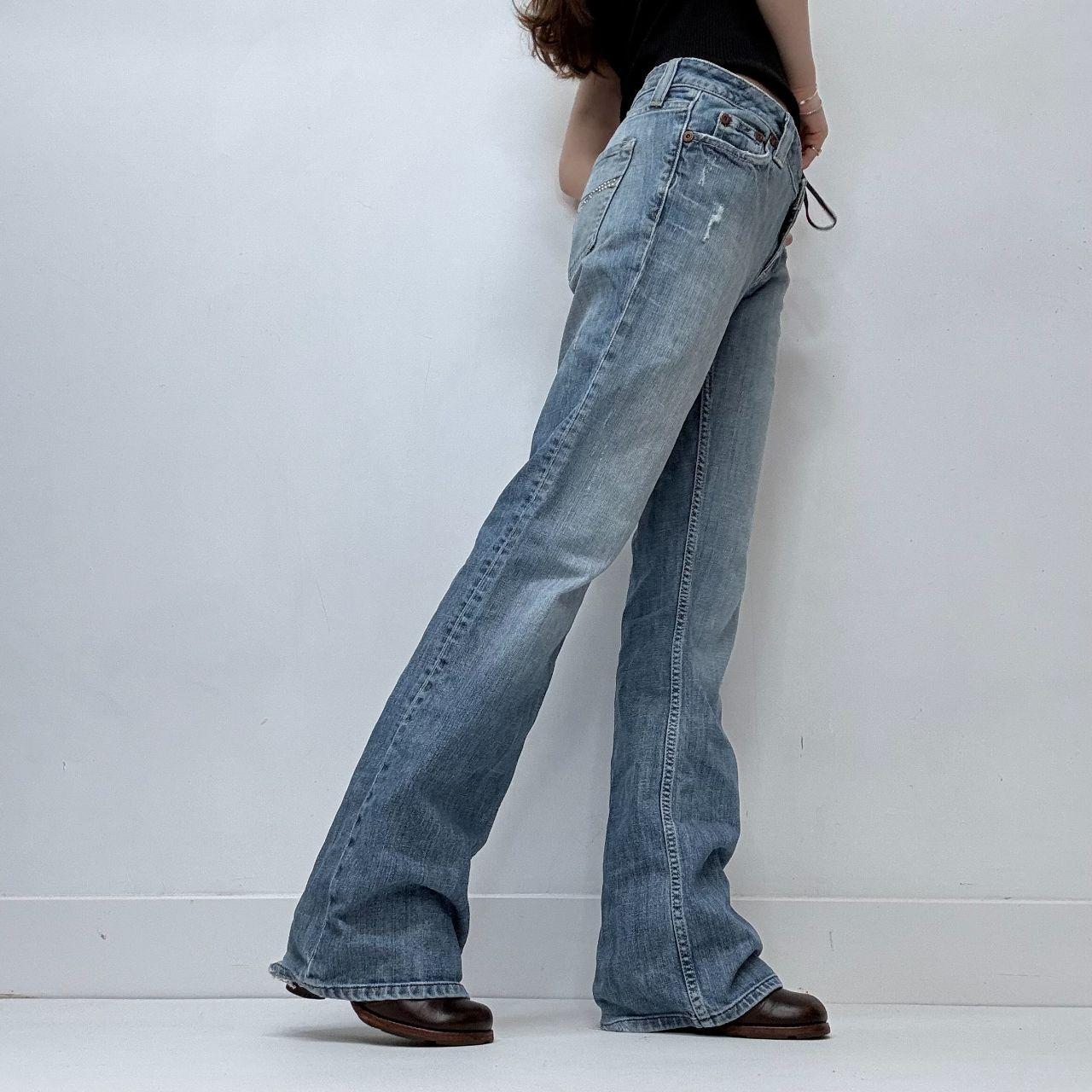 Distressed flared leg low rise jeans