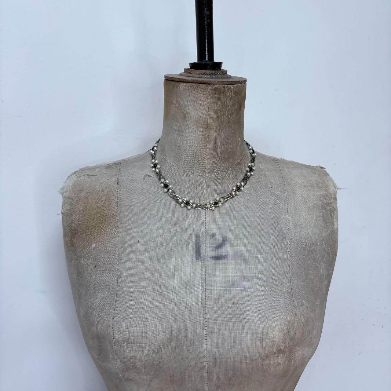 Silver woven pearl necklace