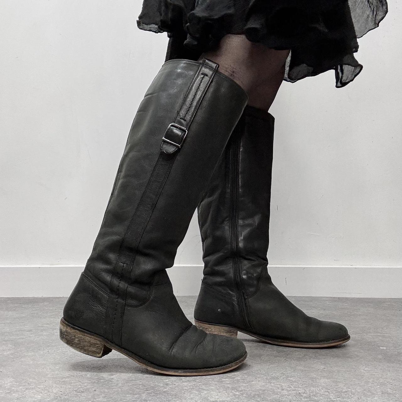 Black leather knee high boots