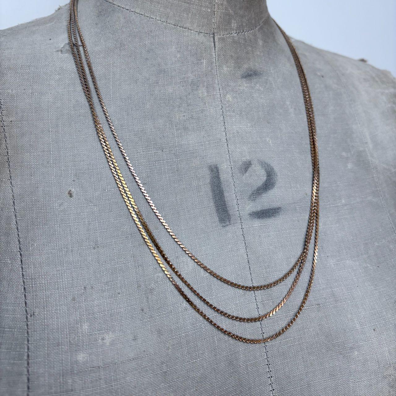 Layered gold tone chain necklace