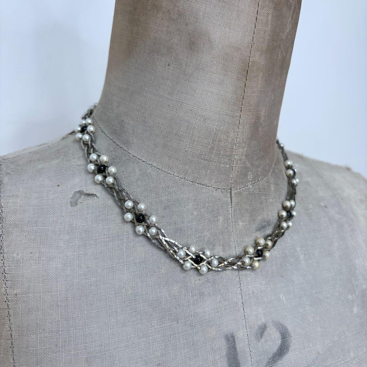 Silver woven pearl necklace