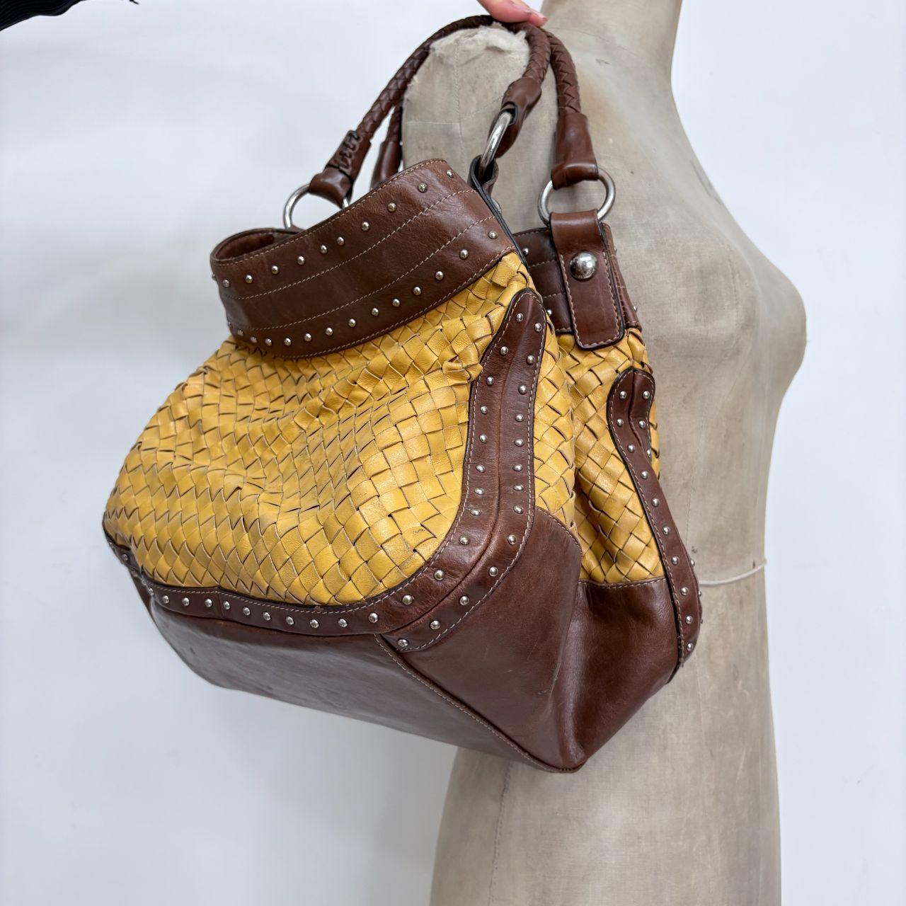 Woven leather studded slouchy shoulder bag