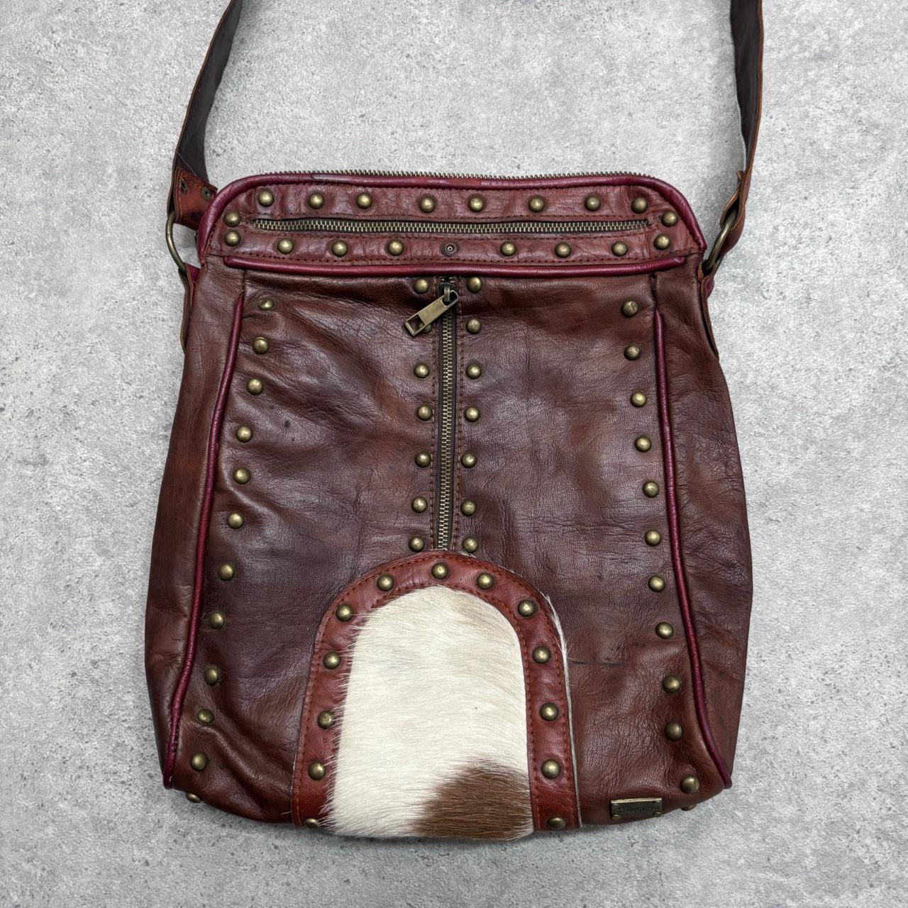 Cow hide studded brown leather bag
